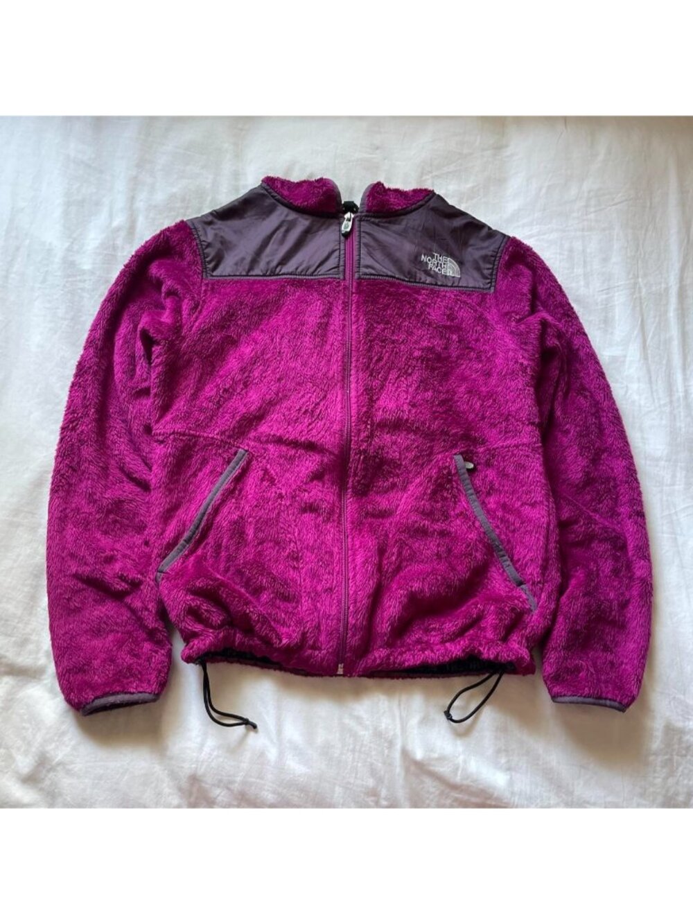 The North Face fuschia fleece zip up jacket